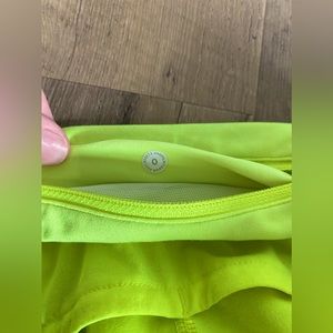Lululemon, 2.5 inch, size 0, lime green/yellow, mid to low rise, speed up